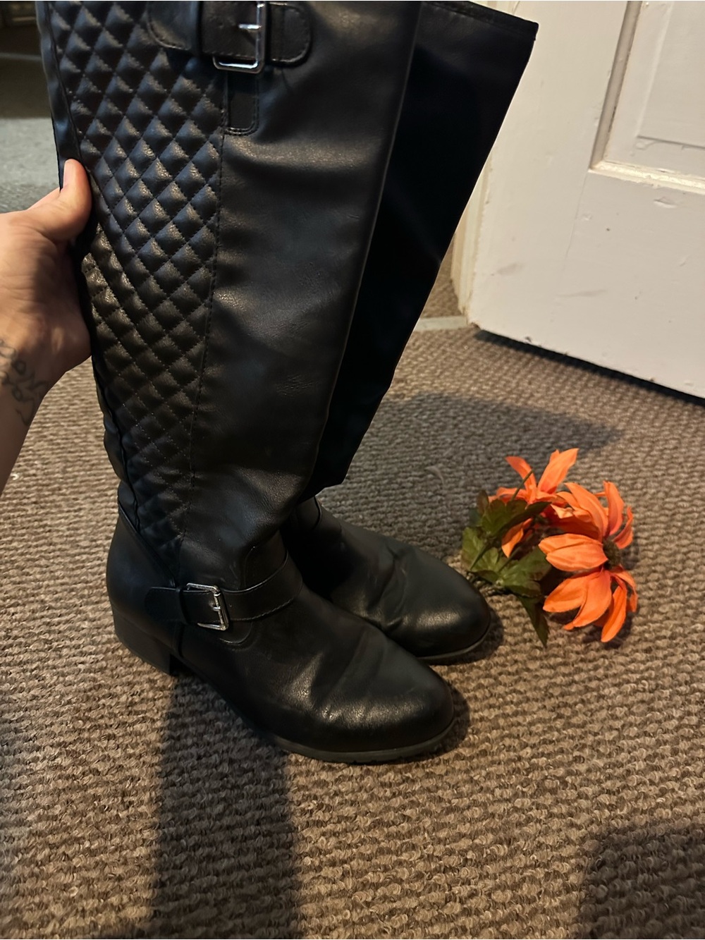 Quilted Black Knee-High Riding Boots with Buckle Detail